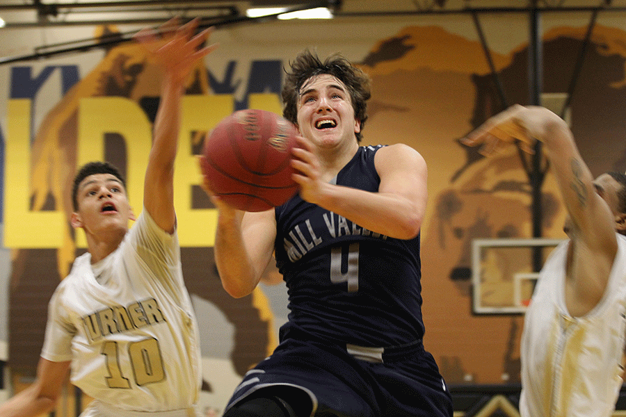 Junior Logan Koch goes up for a layup  during the basketball game against the Turner Bears on Friday, Feb. 13. The Jaguars fell to the Bears 59-5.