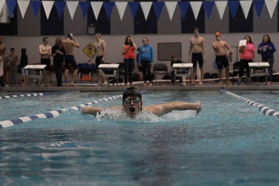 Sophomore Spencer Smith participates in the 100 Yard Butterfly on Tuesday, Feb. 10.