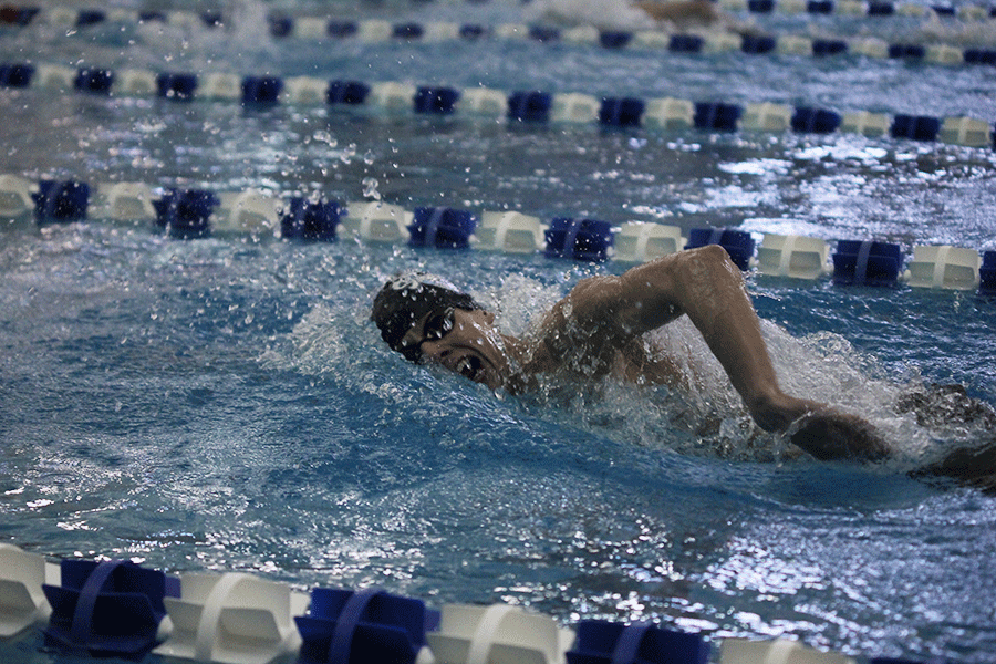 At the boys state swim meet on Saturday, Feb. 21, senior Callahan Eckardt competes in the 200 yard freestyle relay. 