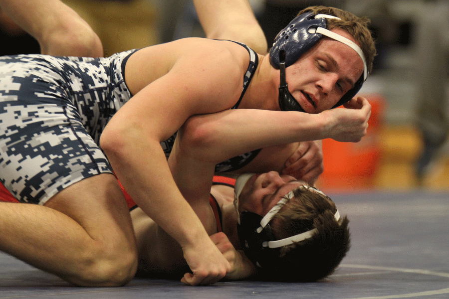 Junior Seth Burnett wrestles an opponent on Thursday, Feb. 5.