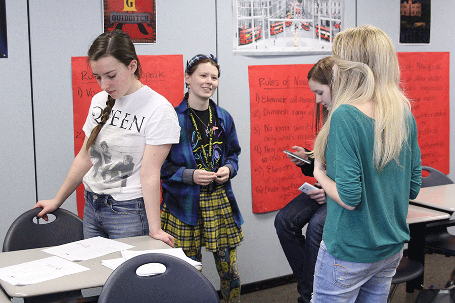 Senior Peyton Barton discusses the final art selection for the literary magazine on Wednesday, Feb. 25. 