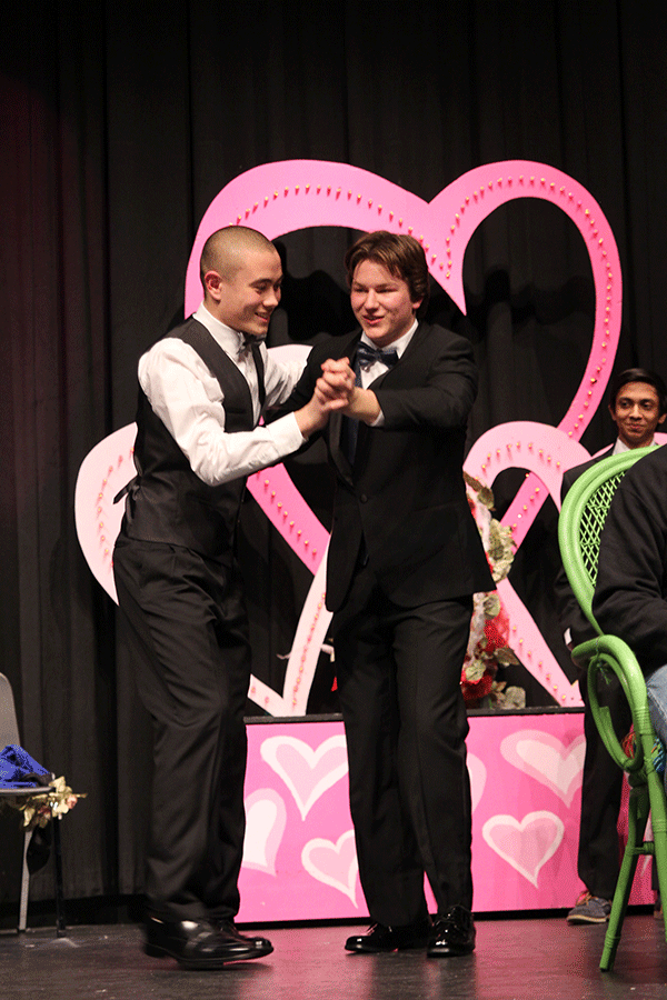 Juniors Chase Midyett and Tyler Shurley dance on stage while waiting for the judges to return.