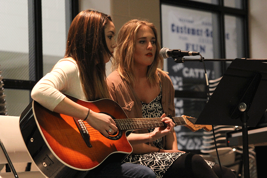 Juniors Kat Knoff and Julia Wheeler perform at Open Mic Night on Thursday, Feb. 26.