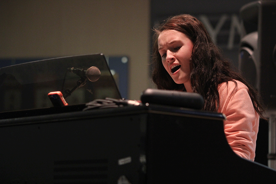 Sophomore Alea Ashford plays piano while singing on Thursday, Feb. 26.