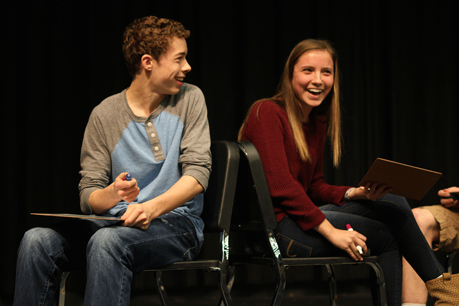 Freshman Hailey Stelle laughs at her boyfriend freshman Luke Guilford as he defends his answer to one of the Know Ya Boo trivia questions.