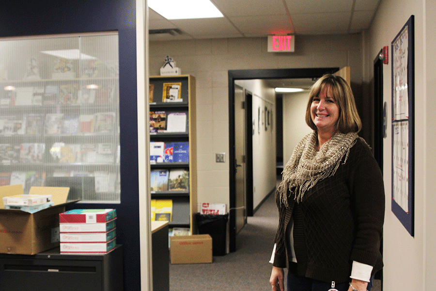 Registar Dean Thom stands in the counseling office on Monday, Feb. 9. Though many students only view her as the "book lady," Thom's reach spans through many aspects of the school.
