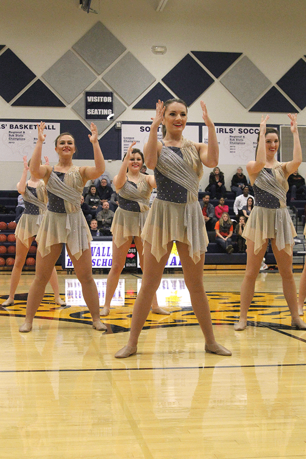 Senior Allison Eigsti performs with the Silver Stars on Friday, Jan. 9 during halftime of the boys basketball game. 