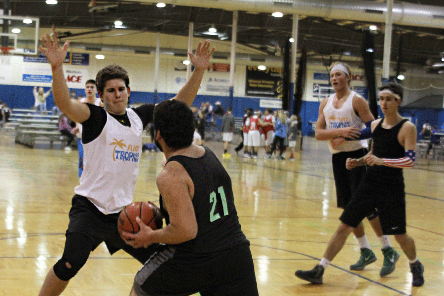 Junior Jack Nielsen of the Flint Hill Tropics competes against Dirty Mike and the Boys on Tuesday, Jan. 20. “Everyone out there is competitive,” Nielson said. “When one is in a competitive environment it is usually fun.”