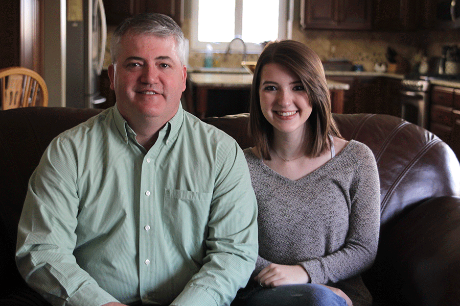 Col. Mark Schuler and junior Morgan Schuler sit in their living room on Thursday, Jan. 29. 