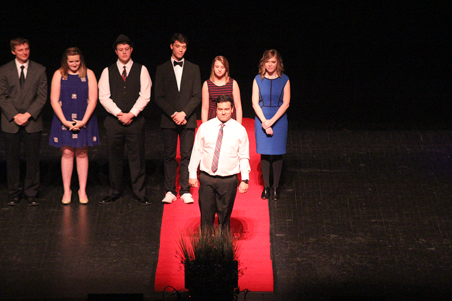While his audition video plays for Theatrical Performance, senior Adam Segura waits at the end of the red carpet while being recognized.