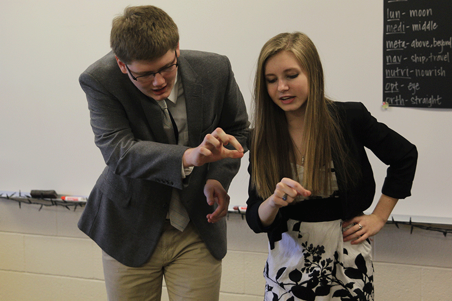 Senior Henry Hanson and junior Megan Feuerborn act out their improv scene.