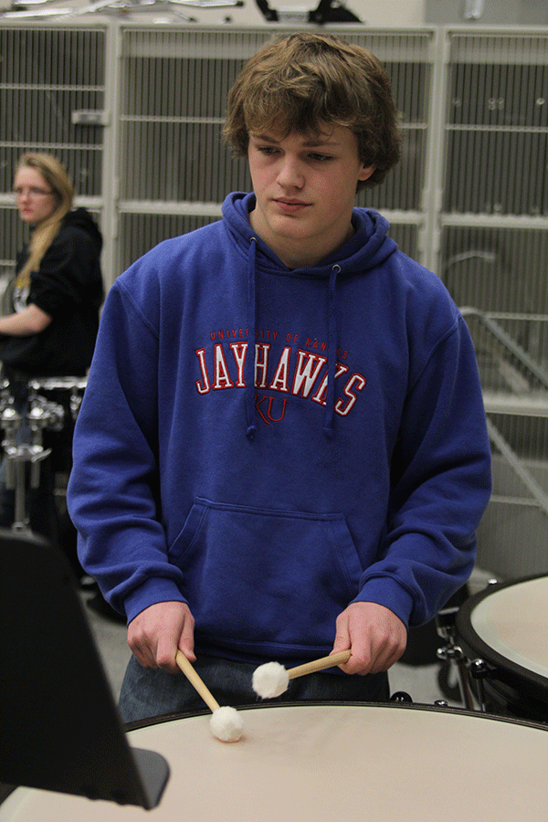 Sophomore Spencer Smith plays the Timpani during Blue Band on Friday, Feb. 27.