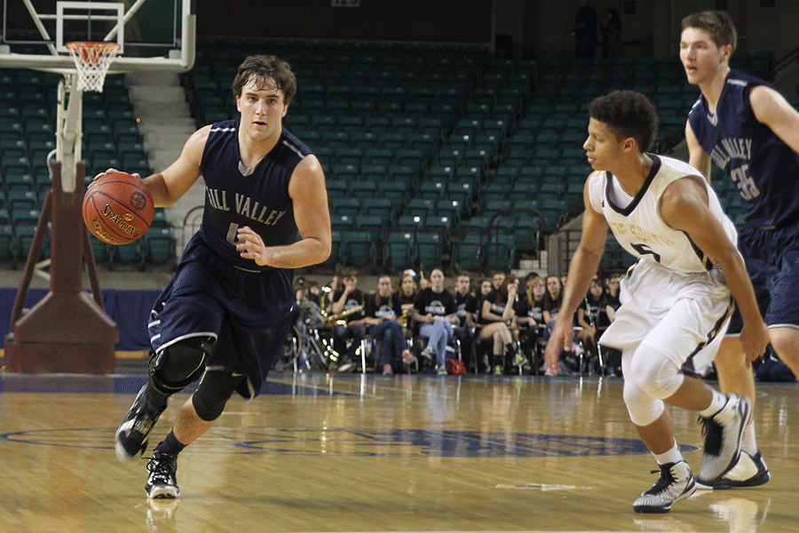 Junior Logan Koch drives to the basket. 