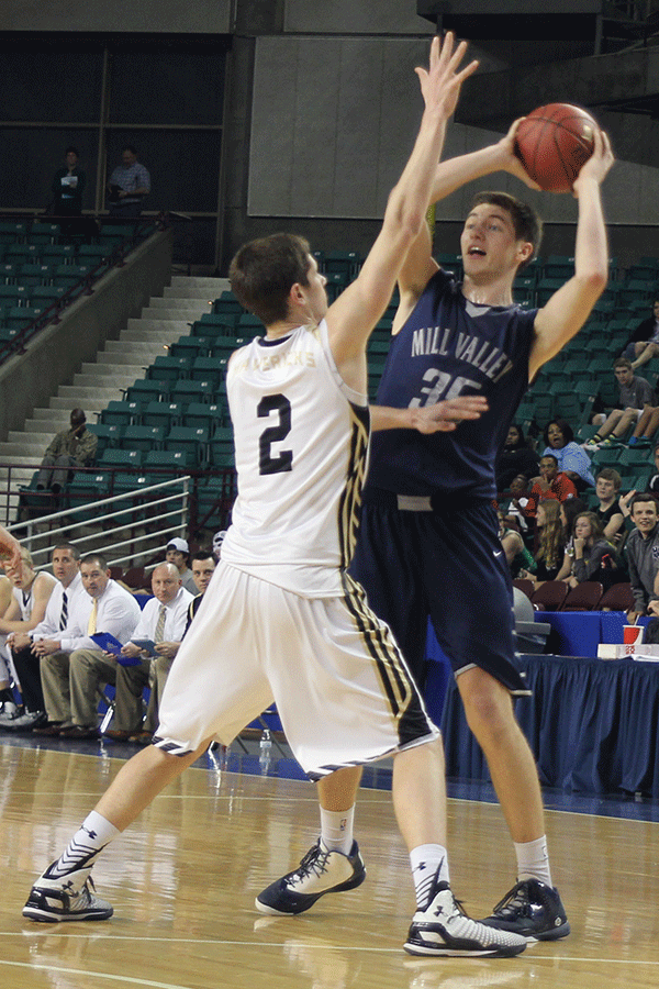 Junior Clayton Holmberg looks for an open teammate. 