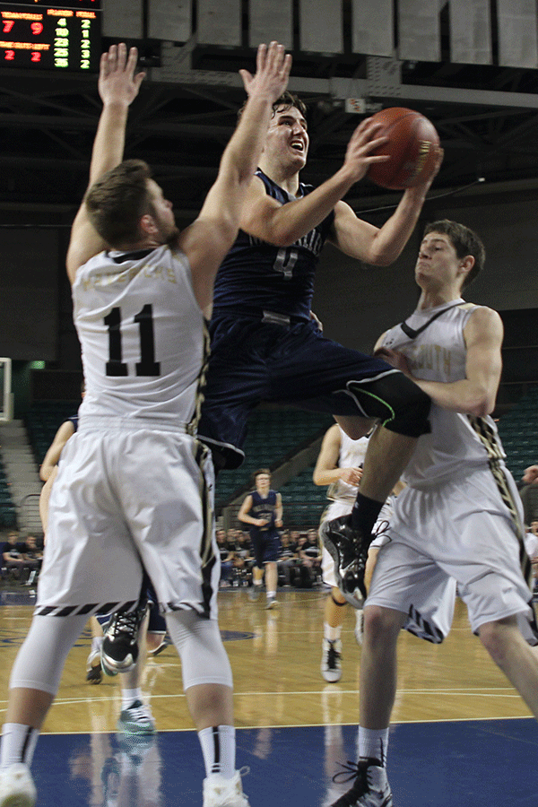 Junior Logan Koch goes up for a layup.