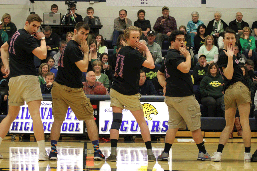 Seniors Chase Battes, Eli Stewart, Spencer Adams, Adam Segura and Caleb Latas dance in the Silver Studs performance on Friday, Feb. 27.