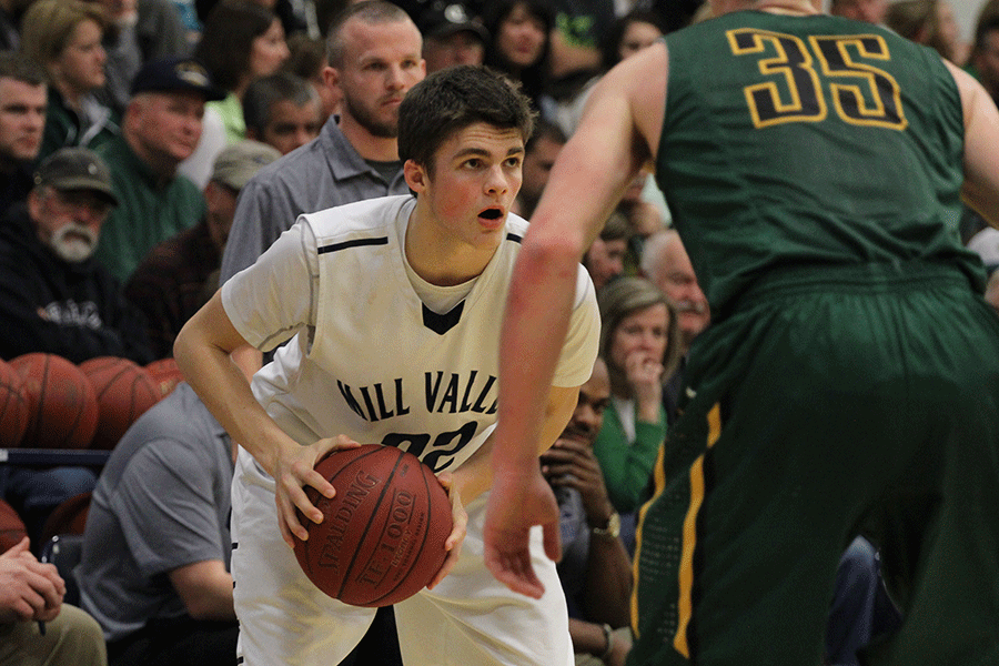 Junior Kasey Conklin looks to pass to a teammate on Friday, Feb. 27. The Jaguars fell to the Basehor-Linwood Bobcats 55-31.