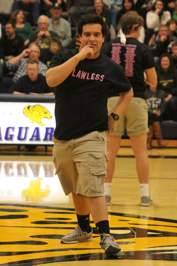 To start off the dance, senior Adam Segura turns around and bites his finger.