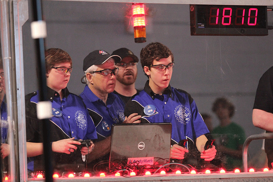 Controlling the Jaguar Robotics robot sophomore Jacob Tiehen participates in the FIRST competition on Friday, March. 13.