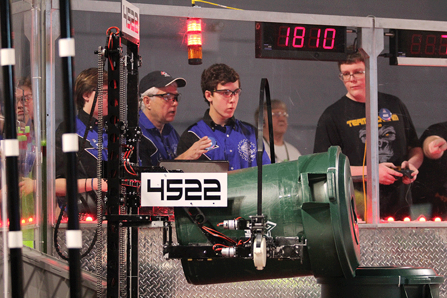 Sophomore Jacob Tiehen controls robot 1810. 