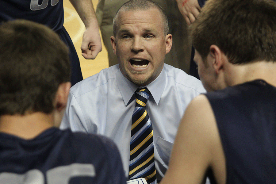 First-year head coach Mike Bennett shouts advice during a timeout. 