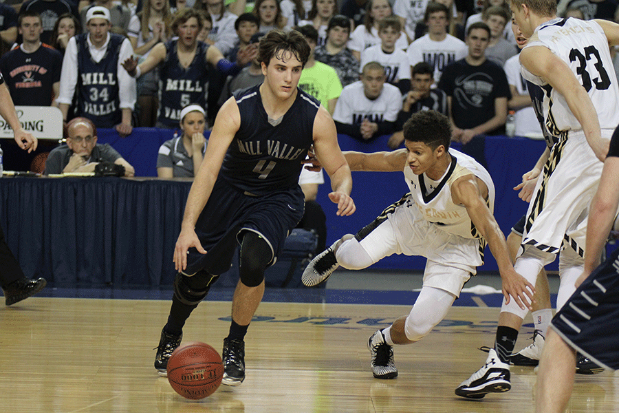 Junior Logan Koch dribbles past an opponent. 