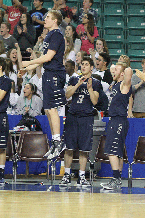 Junior Tyler Grauer celebrates with teammates during the game.