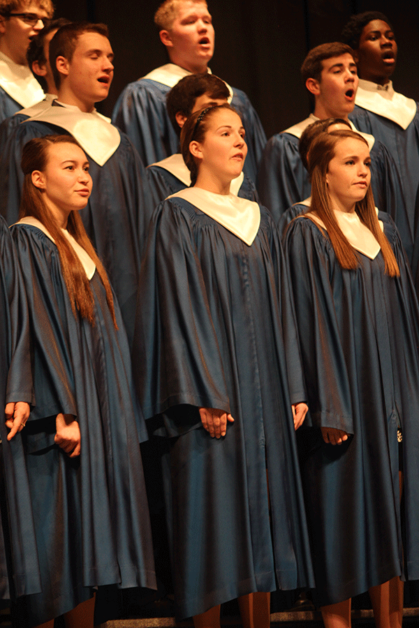 The Freshman Girls and Boys Mixed Choir sings a group song during the choir concert. 