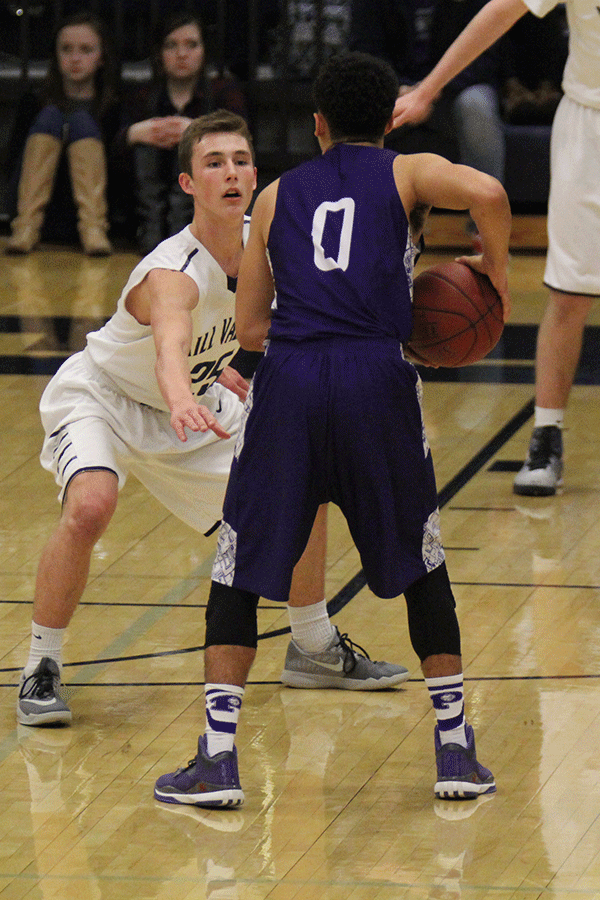 Junior Jason Widmer attempts to steal the ball from a Pittsburg player. 