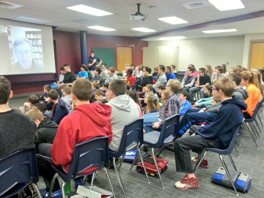 Eighth grade Explorers at Monticello Trails Middle School, along with their science teacher Amy Hanna, Facetime interim director of the Kansas Geological Survey Rex Buchanan, talking about the process of passing the bill on Thursday, Jan. 15.