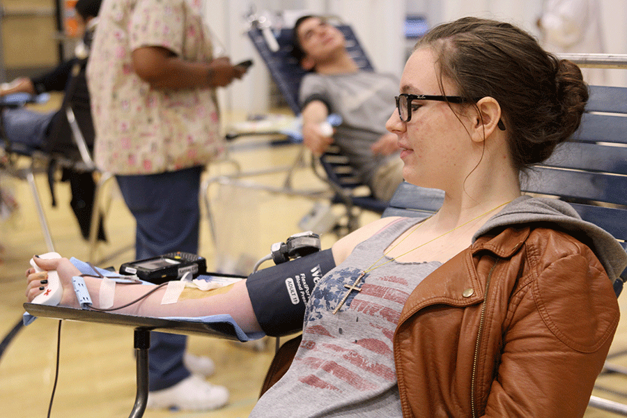 Sophomore Sydney Williamson donates blood on Thursday, March 26.