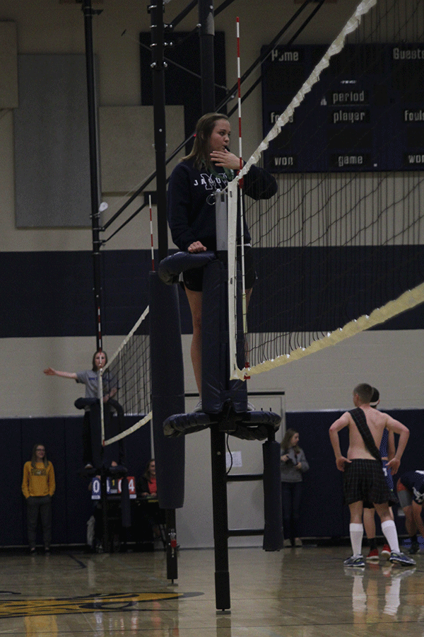 Indicating it was a teams turn to serve, senior Audrey Naughton blows her whistle on Wednesday, March 25. 