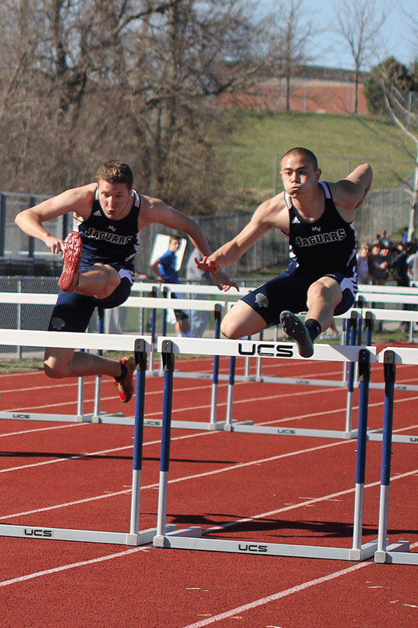 Senior Cody Deas and Junior Chase Midyett compete in the 110 M high hurdles. 