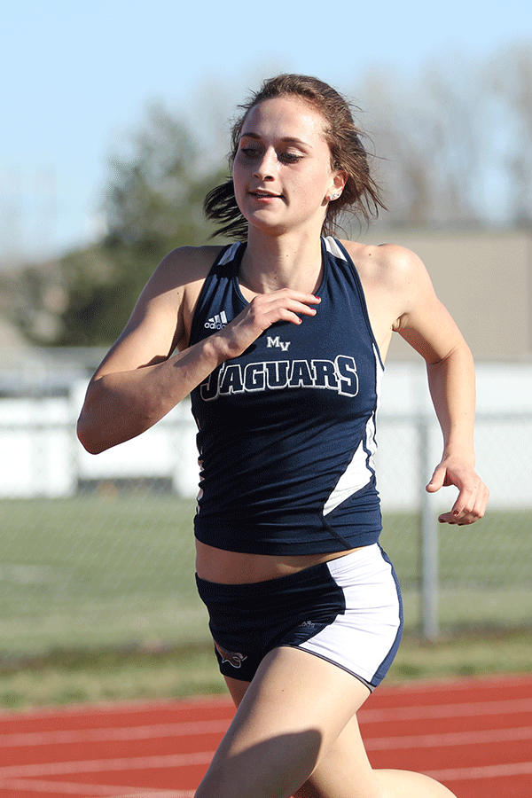 Sophomore Anna Clayborn competes in the mile run.