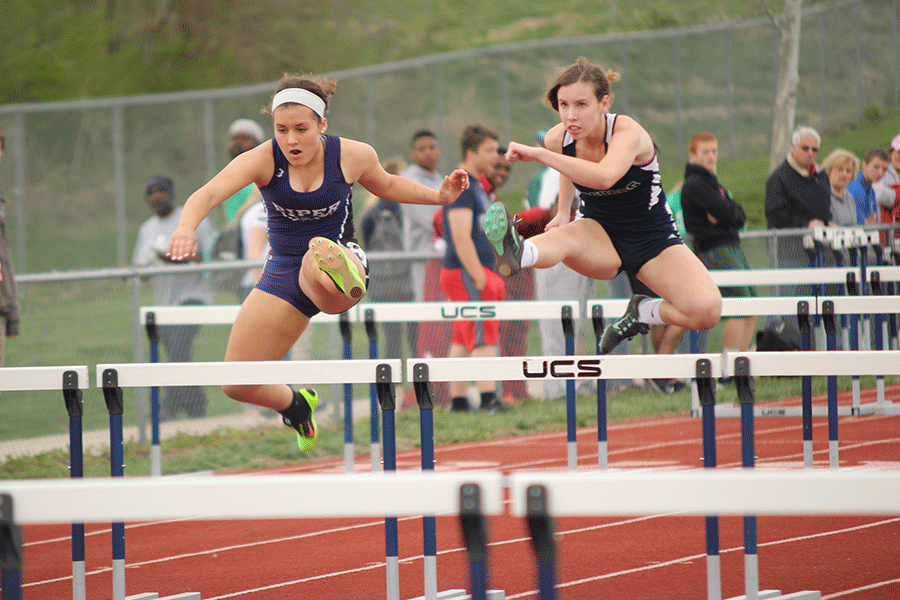 Junior Merrick Vinke jumps over hurdles in the 110m hurdles race on Tuesday, April 14.