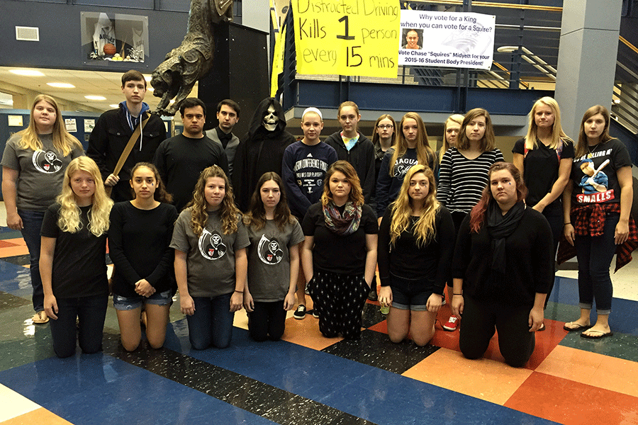 JagPride members, along with other students who signed up, stand in the foyer for annual Grim Reaper Day on Tuesday, April 21.