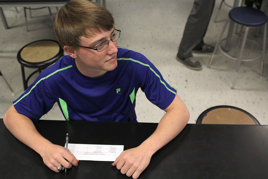 Sophomore Jordan Fullerton listens to speeches given by this years candidates for StuCo executive officers on Monday, April 27.