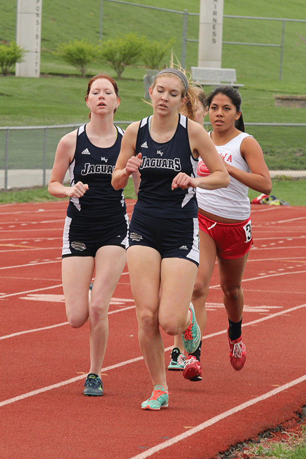 Juniors Amber Akin and Ally Henderson compete in the 1600m.