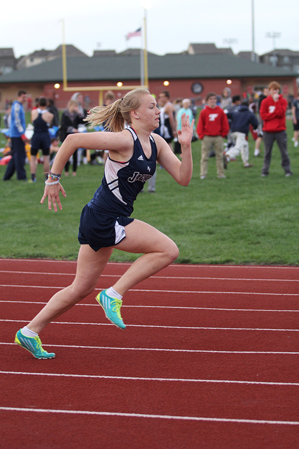 Sophomore Brooke Weibe sprints to finish her race.