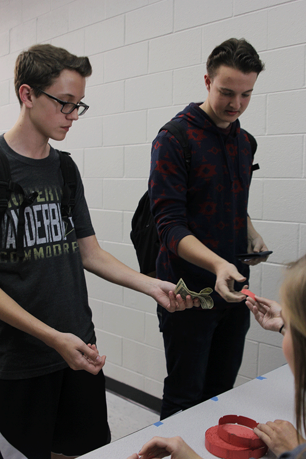 Students purchase their tickets for the annual April Fools’ Day Film Fest.