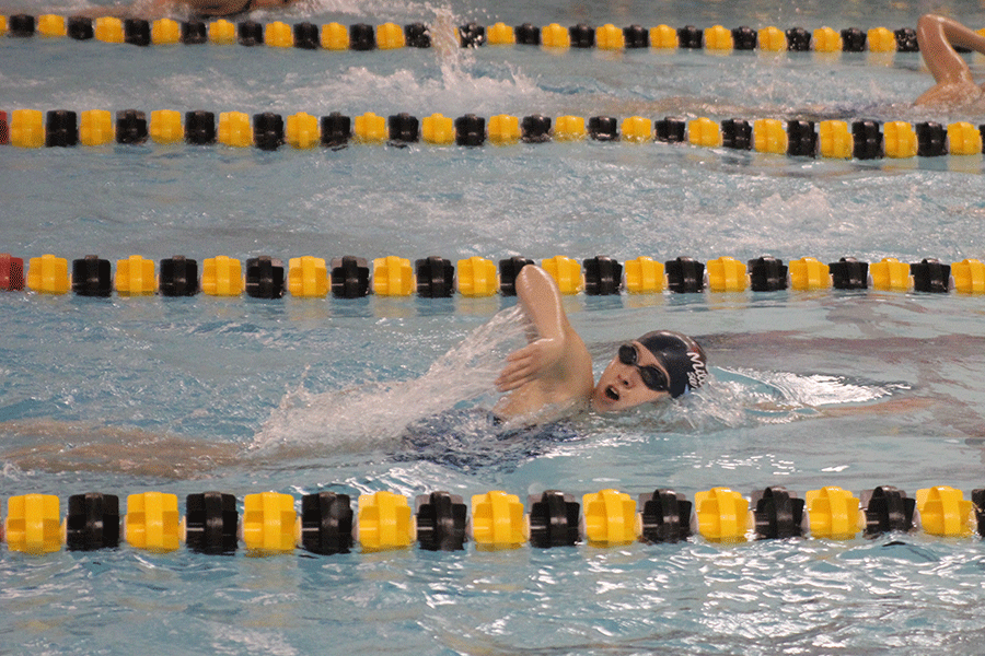 Senior Michaela Dervin competes at Blue Valley High School on Tuesday, April 14.