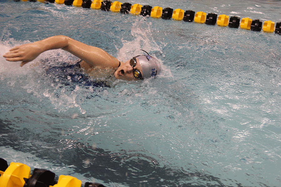 Junior Lilly Lutz competes in her heat.