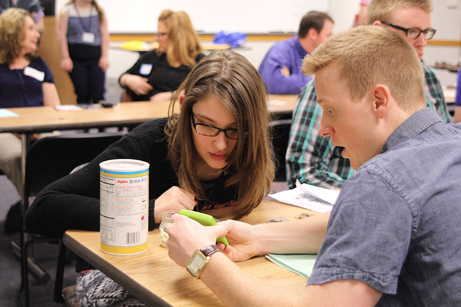 Freshman Emily Wagner talks with the judge at the completion of her event.