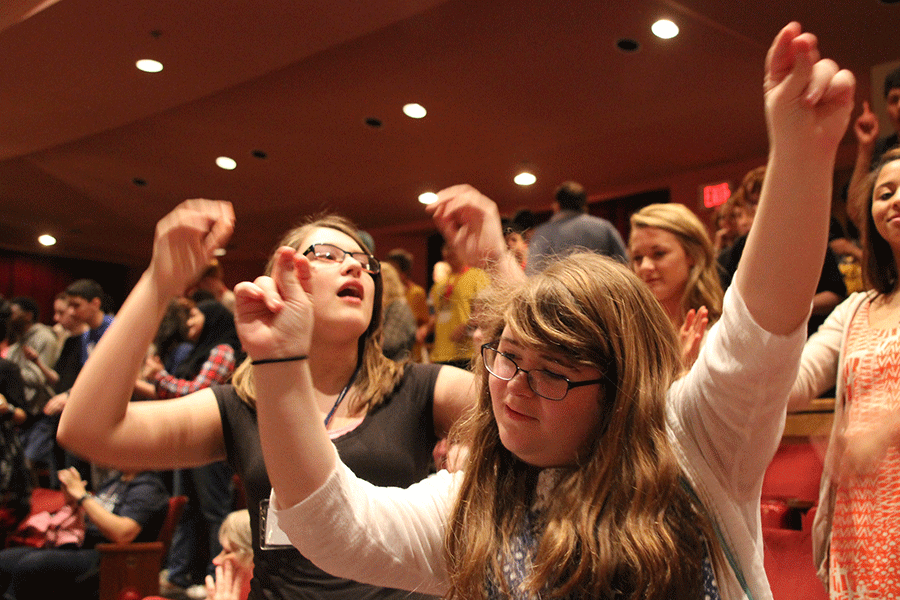 Junior Sara Pietig and freshman Emily Wagner dance to the song What Makes You Beautiful by One Direction before the awards ceremony.