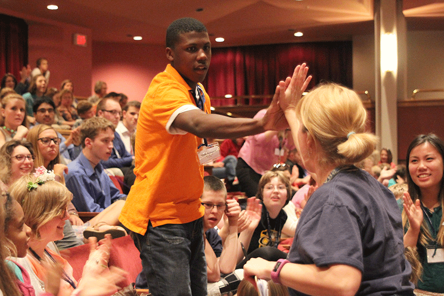 Freshman Malik Redmond and special education teacher Shannon Long celebrate as Redmond is recognized for a third place finish among all freshman in role-playing.