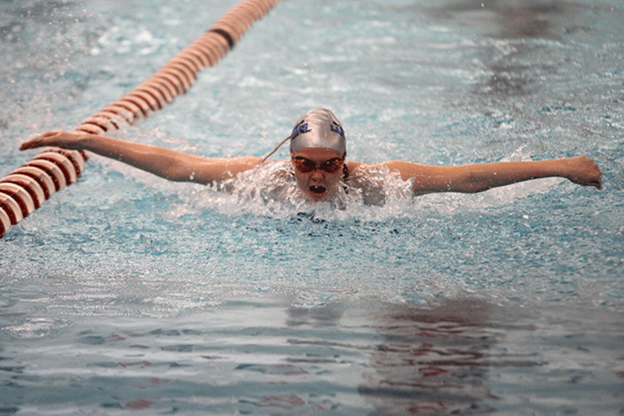 Junior Jennifer Sims competes in the fly.