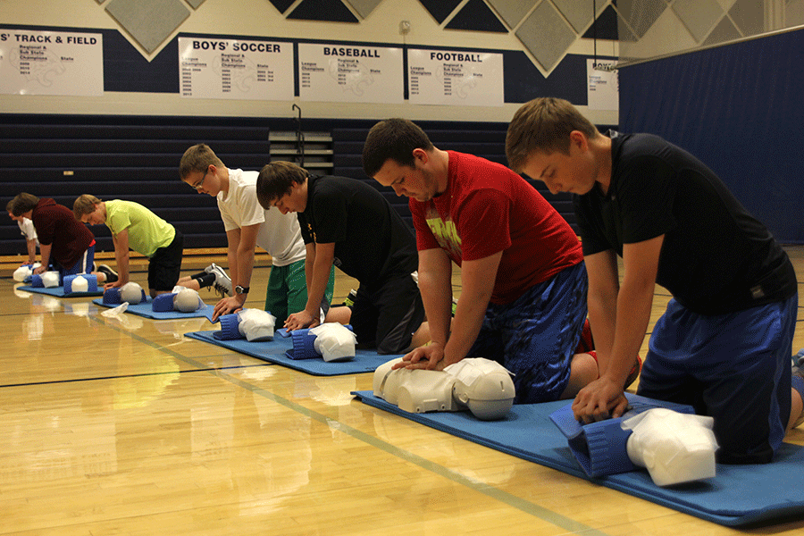 The freshman boys learn how to do CPR and The Heimlich on Wednesday, Apr. 1.