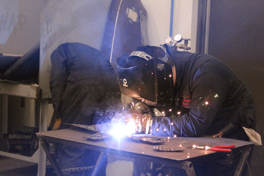 In order to repair a damaged Chevrolet trailblazer on Thursday, April 23, junior Jordan Purvis welds during his Auto Collisions class at Eudora High School. “One reason that I decided to join the [Auto Collisions] program was to see if it [was] an occupation that I wanted to get into,” Purvis said. 