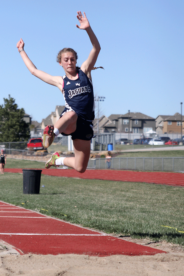 Competing in the track meet, sophomore Morgan Thomas jumps during the long jump event on Tuesday, March 31.