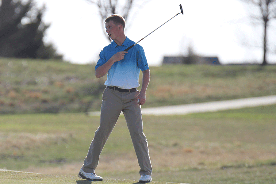 On Monday, March 30, senior Devan Thomas watches after he hits the ball at the Blue Valley Invitational.